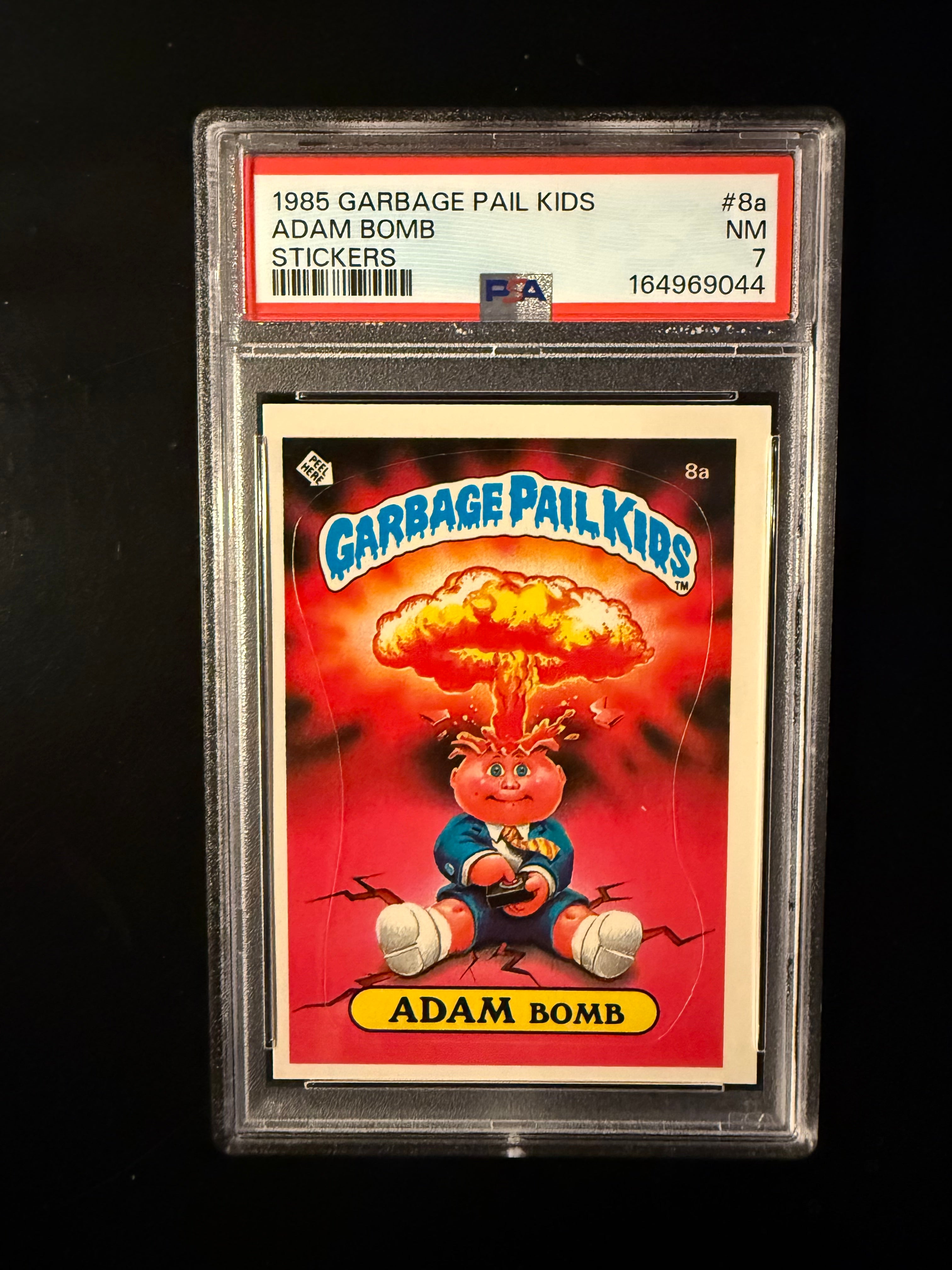 1985 Garbage Pail Kids #8a Adam Bomb – PSA 7 NM – Series 1 Original Sticker